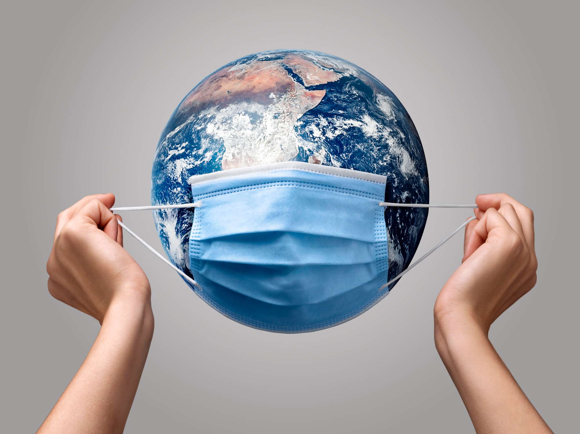 1694778661 person putting medical mask earth